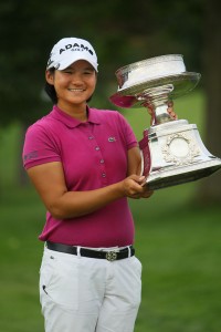 Yani Tseng with one of the 12 trophies she collected in 2011. Photo copyright Icon SMI. 