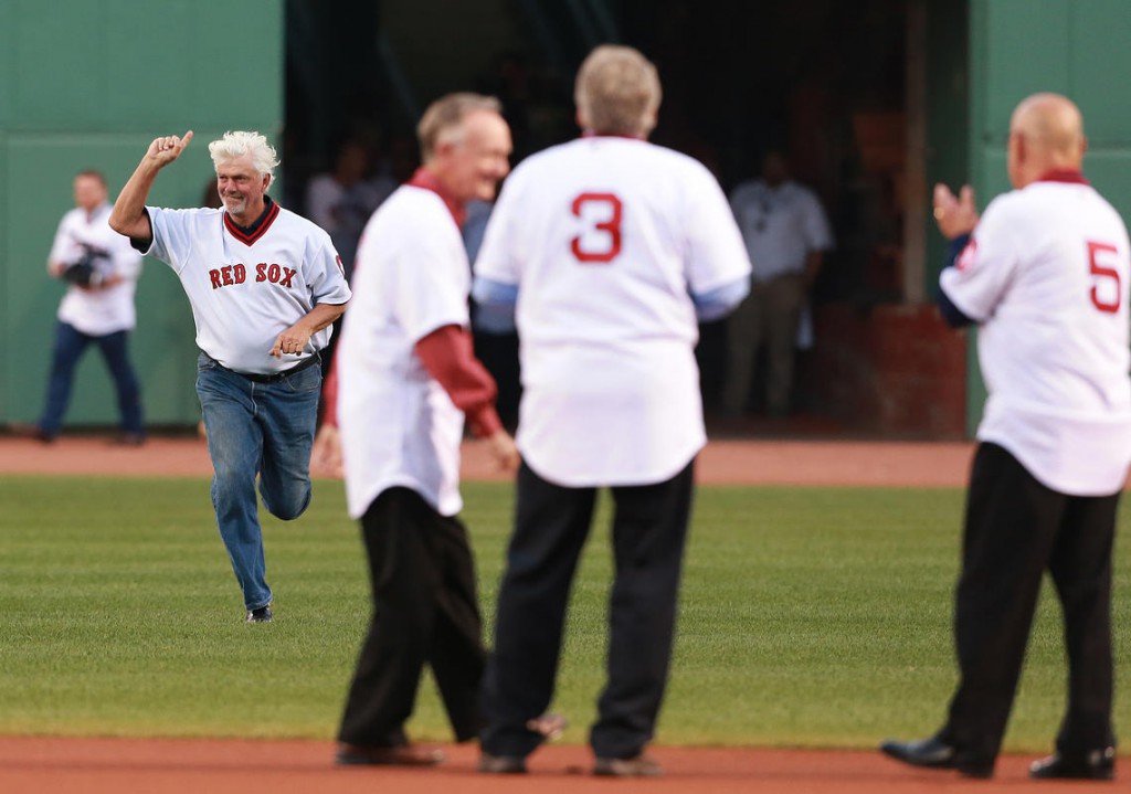 Bill Lee trots in from centerfield during a 40th anniversary celebration of the 1975 Sox, at Fenway Park.