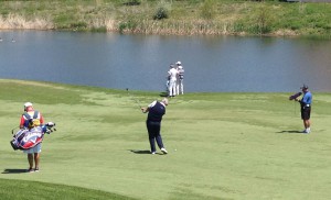 Montgomerie kept it in the short stuff on No. 6 Sunday, while Langer (in white) was living on the edge.