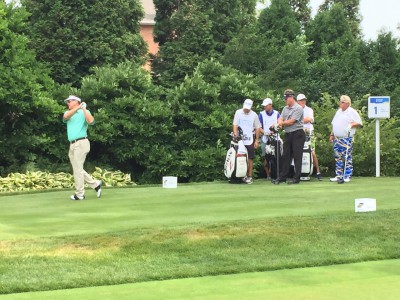 John Daly (right) and Todd Hamilton watch as Brandt Jobe tees off at Senior Players Championship.