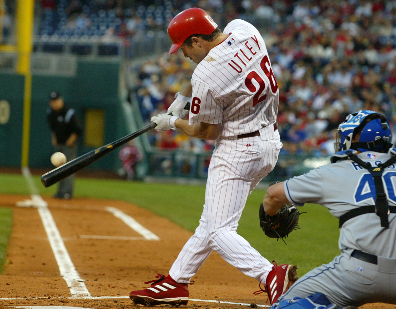 Baseball Player Hits the Ball