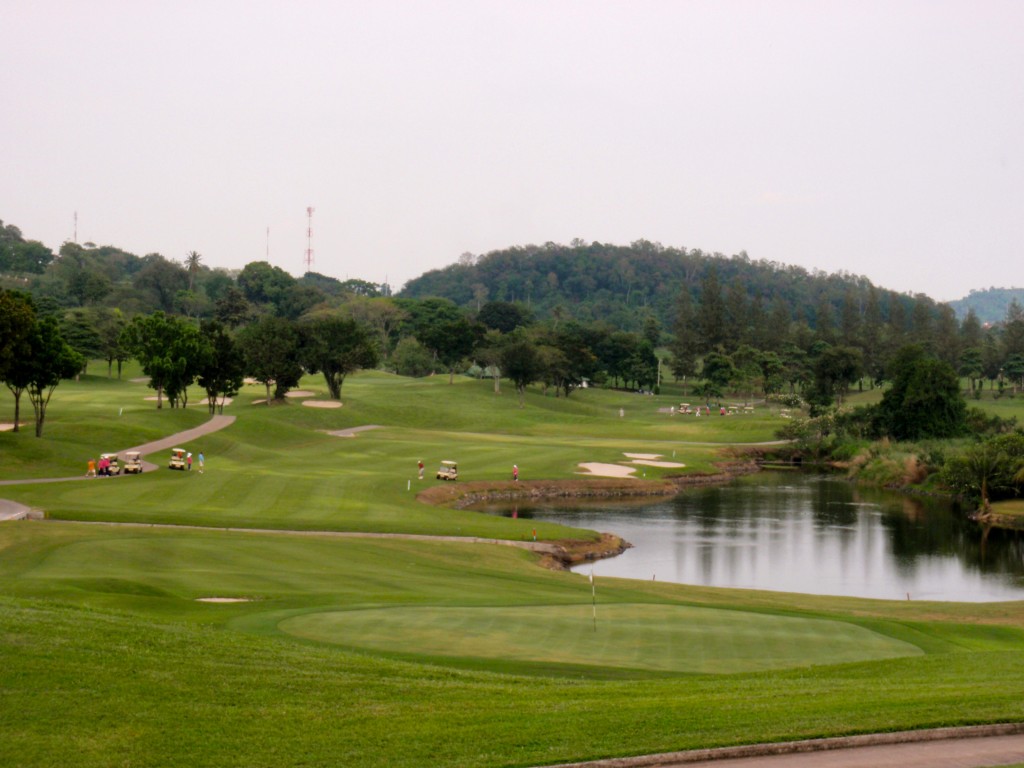 Below is the par-five 10th hole with water on the golfer’s left and trees and bunkers right, and a cross-hazard. The green is more elevated that it appears in the photo and well-bunkered in front.