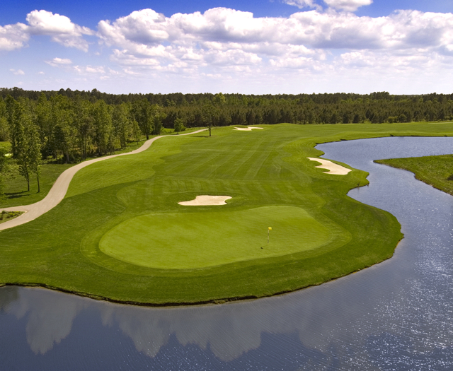 The long par-six 18th at Farmstead begins in South Carolina and finishes in North Carolina. If the 767 flat yards don't get you, the sand and water just might!