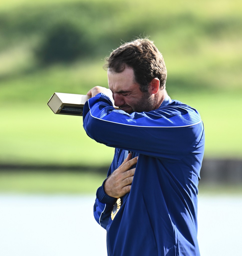 Overcome by emotion on the medal podium