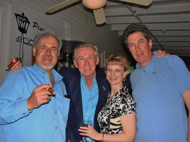 Eddie McKenzie (center) with Janeen Driscoll, now the USGA director of public relations, and MOTO members Jerry Carbone and David Cotton at the Magnolia Inn in Pinehurst