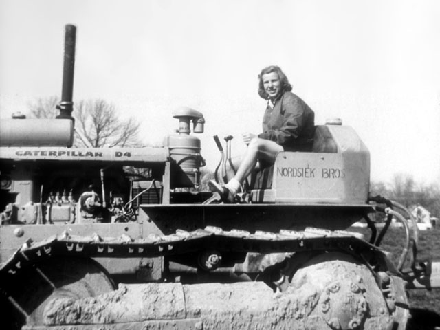 Alice Dye on a bulldozer in the early days