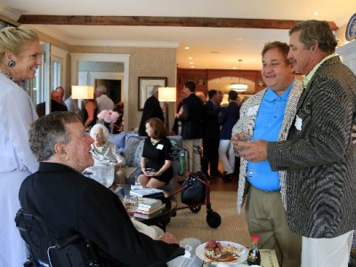 Ken Raynor (right) with Michael Patrick Shiels and President Bush at Kennebunkport