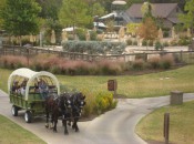 Texas-style covered wagon rides, water slides, golf and spa at Lost Pines Resort. Photo Credit: Harrison Shiels