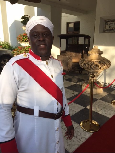 The unformed doormen in traditional garb welcome guests to the timeless Oyster Box in Durban