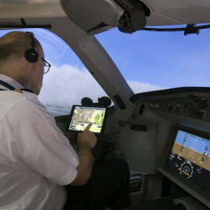 A Delta pilot uses Flight Weather Viewer turbulence app. (Photo Courtesy by Delta News Hub)