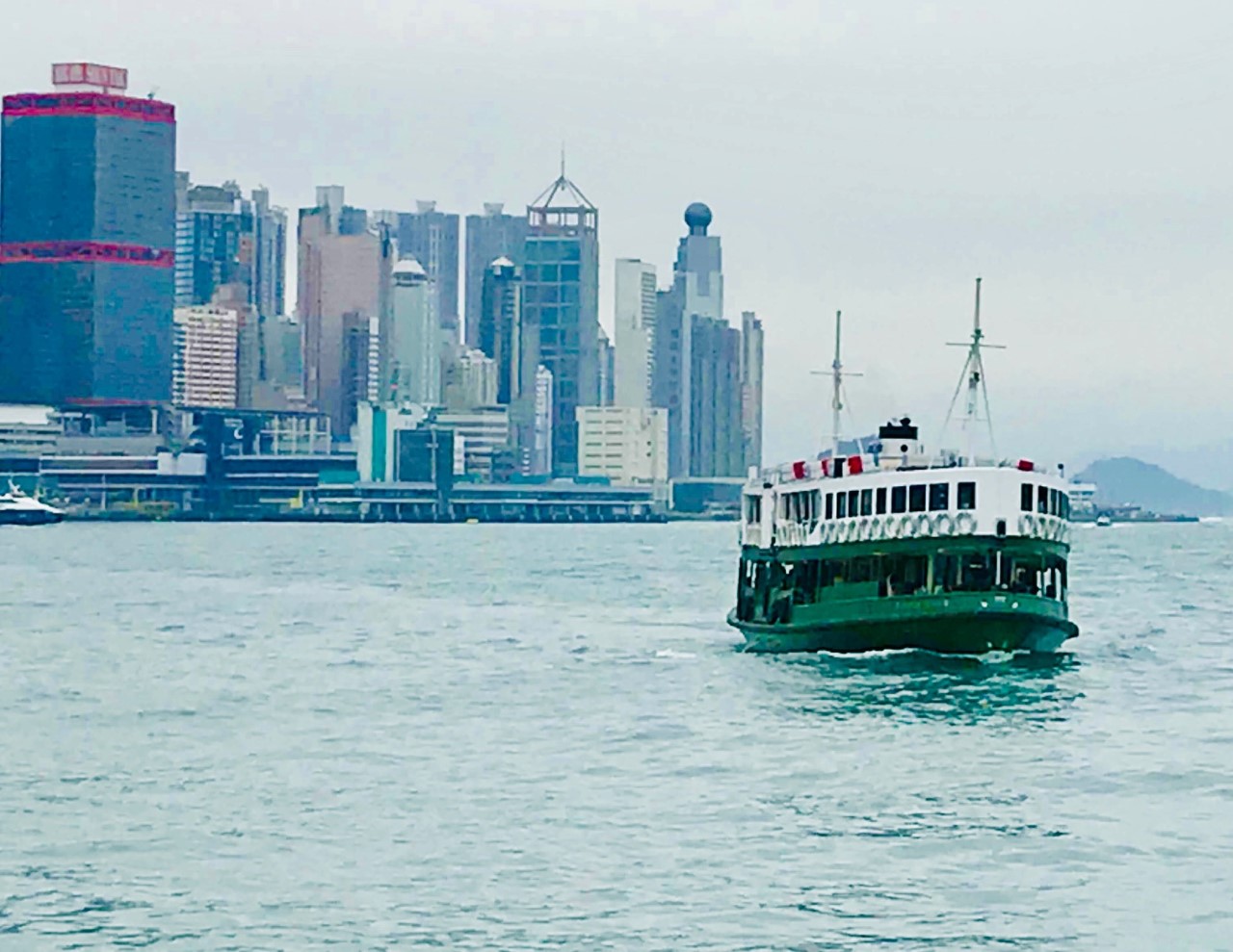 The Star Ferry floats across Hong Kong’s Victoria Harbor. (Photo credit Larry Olmsted)