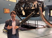 Andrea Vecchi in front of Dallara’s secret, space-age, super car race simulator. Image by Harrison Shiels