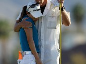 Caddie John Limanti tries to comfort I.K. Kim after her blown putt. (Getty Images)