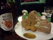 A chocolate yule log with gingerbread man. Had to be done.