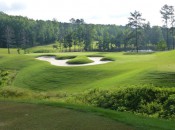 Echelon's par-3 3rd, playing over a Rees-ified bunker with pillow-soft banks.