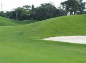 Artifice: Playing the blind third shot at Playa Paraiso's 18th hole