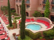 Grand Del Mar's private pool area including a luxury Jacuzzi with cushioned beds and chaise lounges. PHIOTO CREDIT: Harrison Shiels