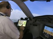 A Delta pilot uses Flight Weather Viewer turbulence app. (Photo Courtesy by Delta News Hub)