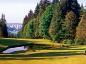 The fifth at Capilano.  Off the tee, part of the Vancouver skyline is visible through the pines.