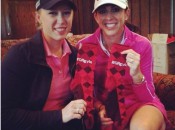 Morgan Pressel (l) and Nicole Castrale display the GRgyle socks