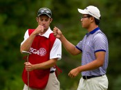 Caddie Eric Hedspeth and Jim Liu fist-bump in the first round of match play, only to hit bigger bumps in round two.