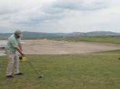 First tee at Machrihanish. Take it over the beach.