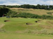 The 13th, a one-shotter guarded by a valley, bunkers and gorse.