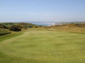 Looking back down the 17th hole at Pennard GC and over to the Gower Peninsula © James Mason