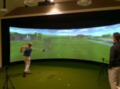 Manchester CC head golf professional Todd McKittrick watches a member take his hacks on on MCC’s aboutGolf SimSurround Curve golf simulator (Photo: Gil Talbot Photography)